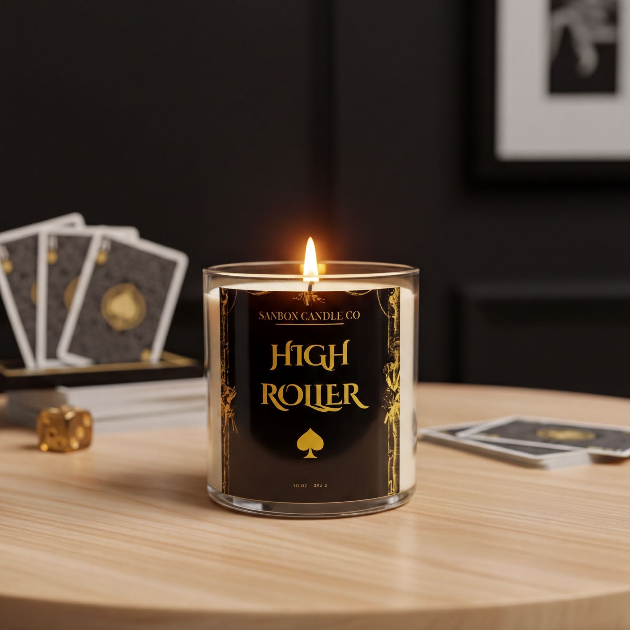 A lit candle labeled "High Roller" sits on a wooden table, with playing cards and a dice nearby.