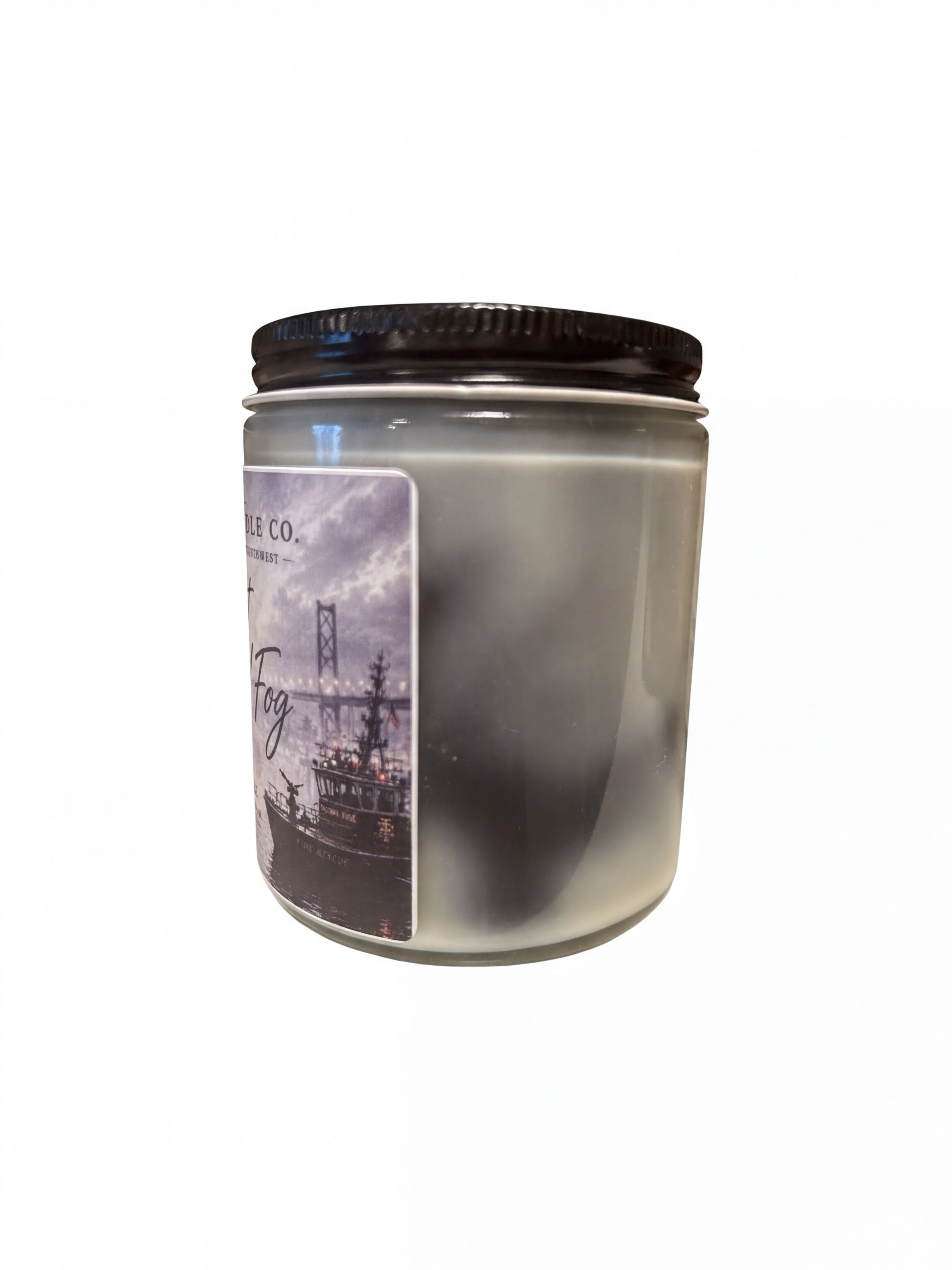 a jar with a label that includes a picture of a ship and a bridge.