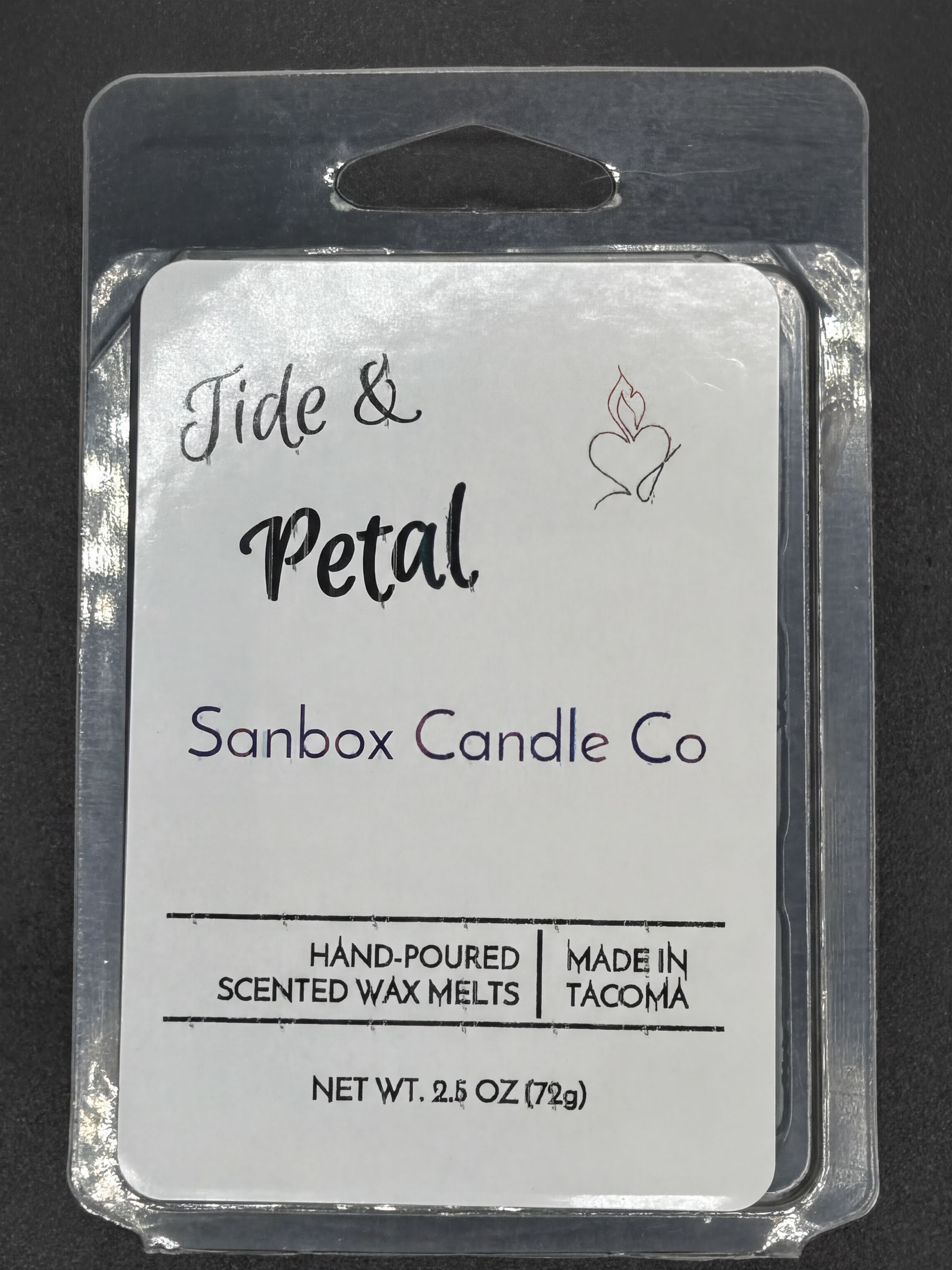 Tide & Petal hand-poured scented wax melts, 2.5oz pack, made in Tacoma, on black background.