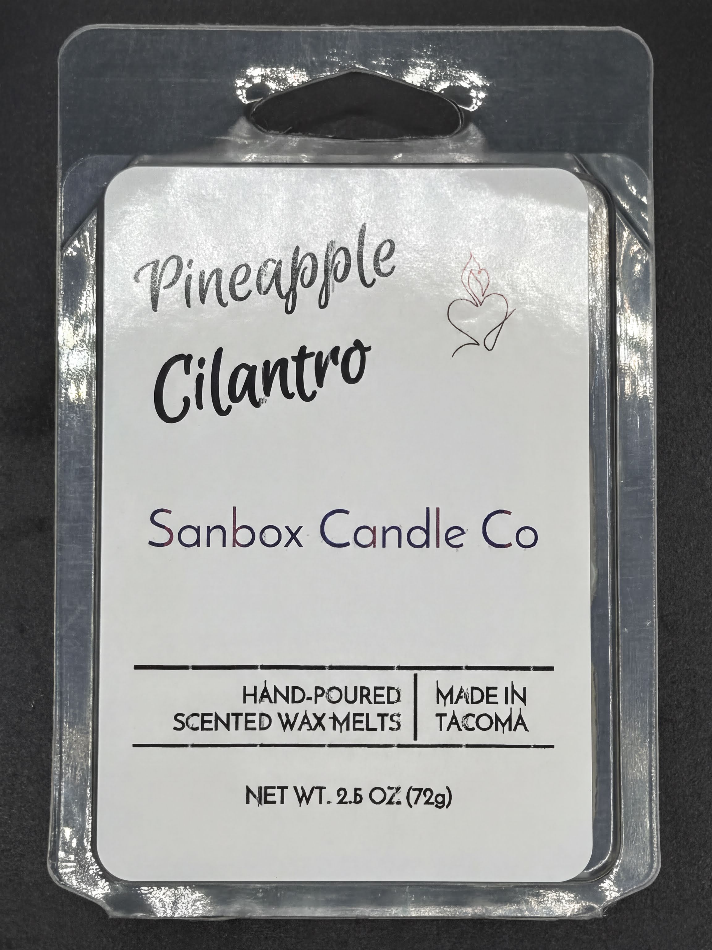 Pineapple cilantro scented wax melts package, hand-poured, 2.5oz, on a dark background