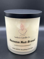 Banana Nut Bread scented soy wax candle in glass jar with black lid, 10oz size