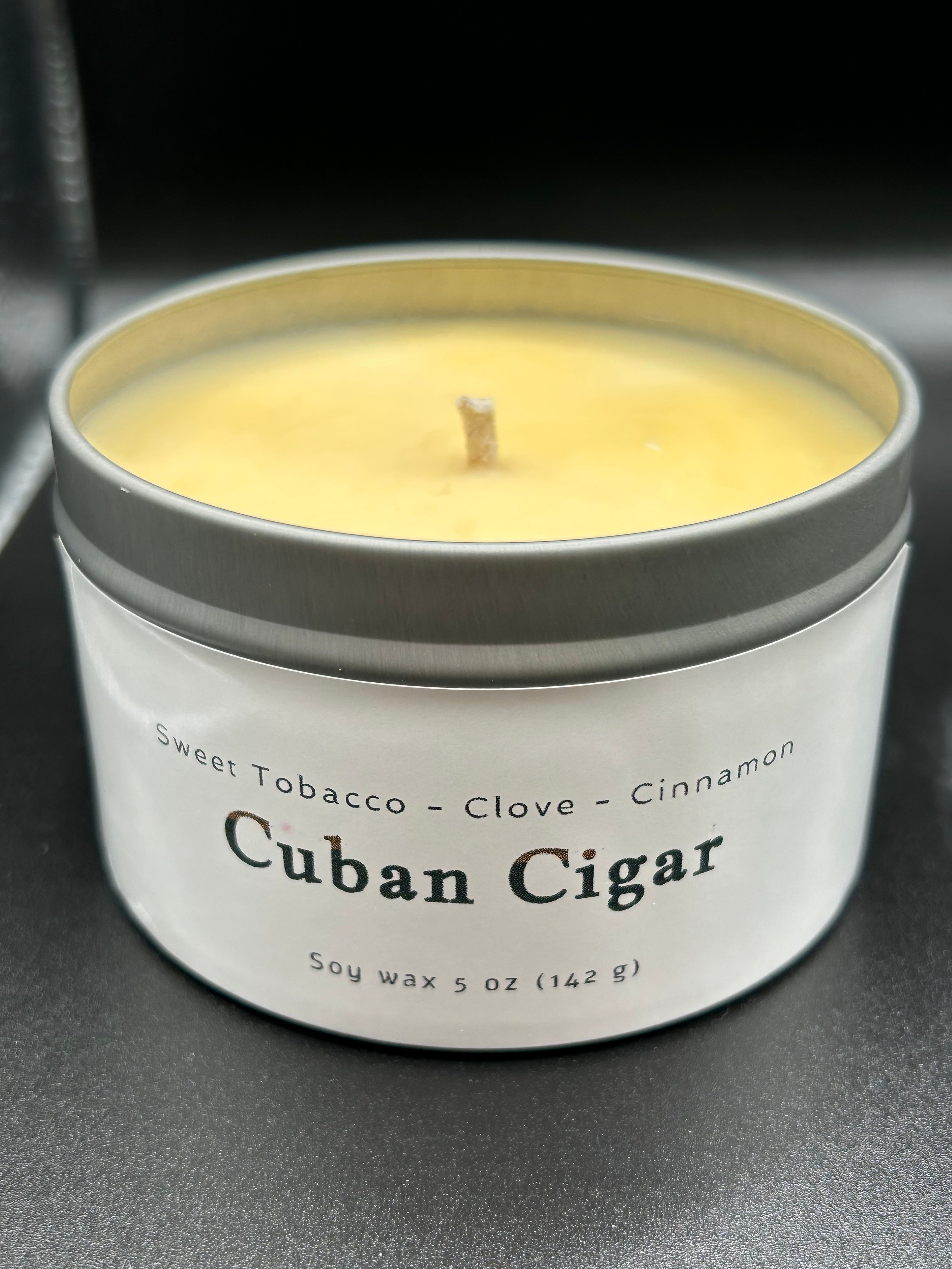 Cuban Cigar scented soy wax candle in a metal tin, 5oz, with clove and cinnamon notes.