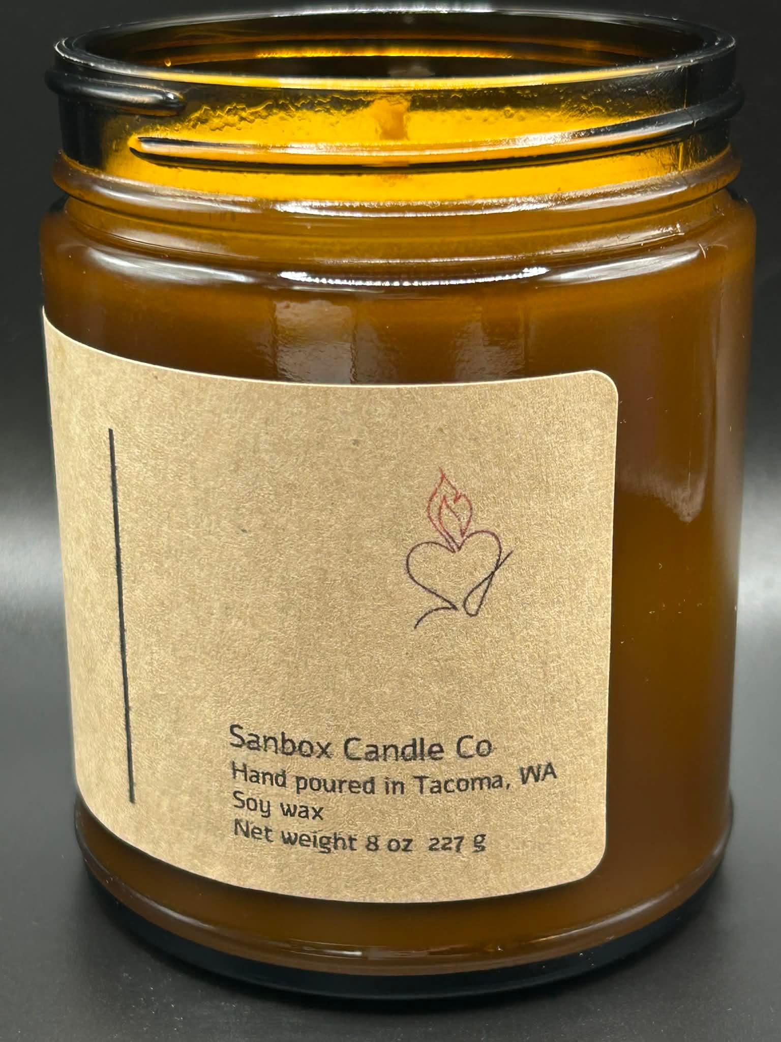 Amber glass jar with kraft label and soy wax candle, 8oz hand-poured, front view