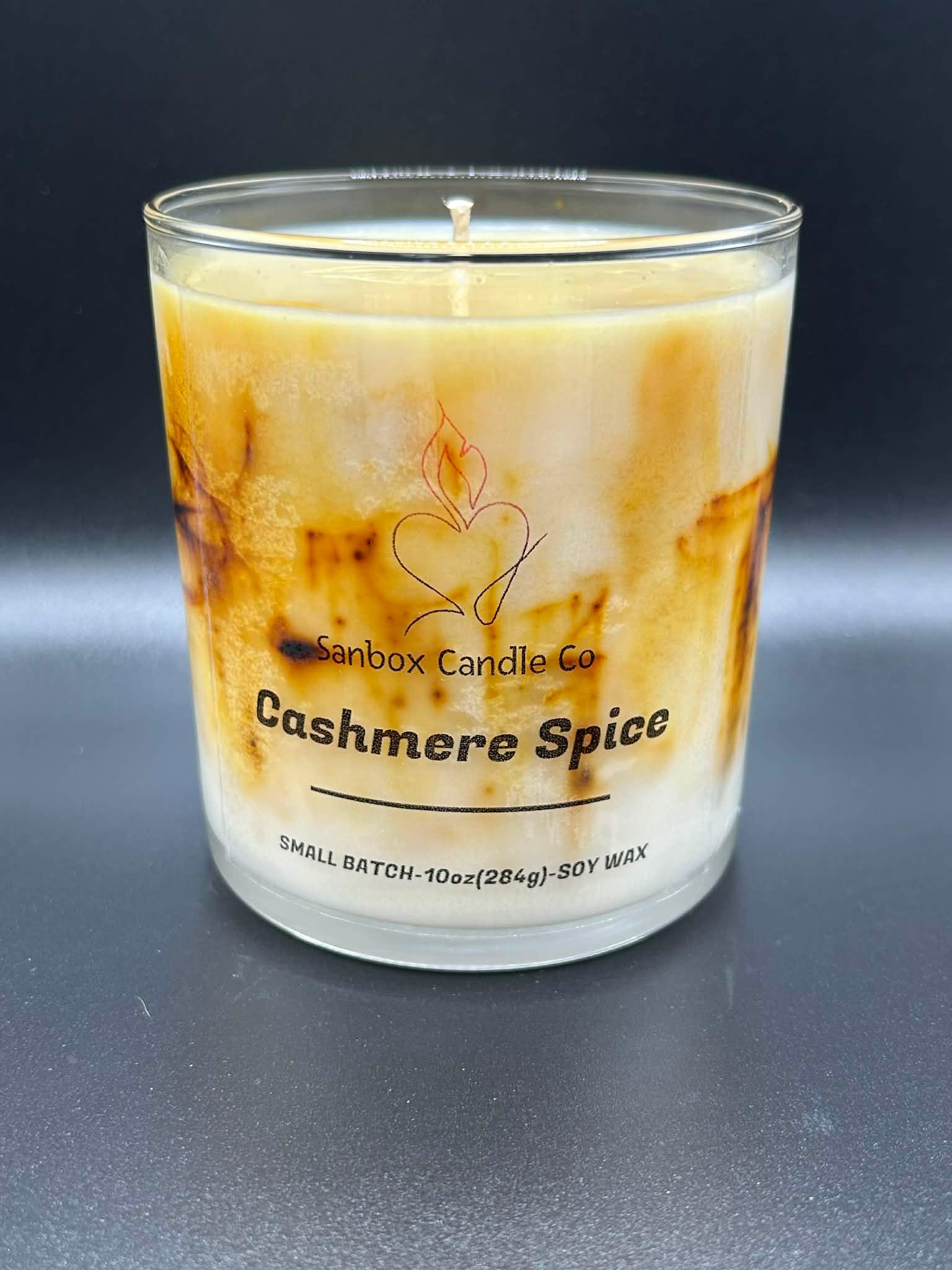 Cashmere Spice scented soy wax candle in glass jar with warm brown swirls, 10oz size.