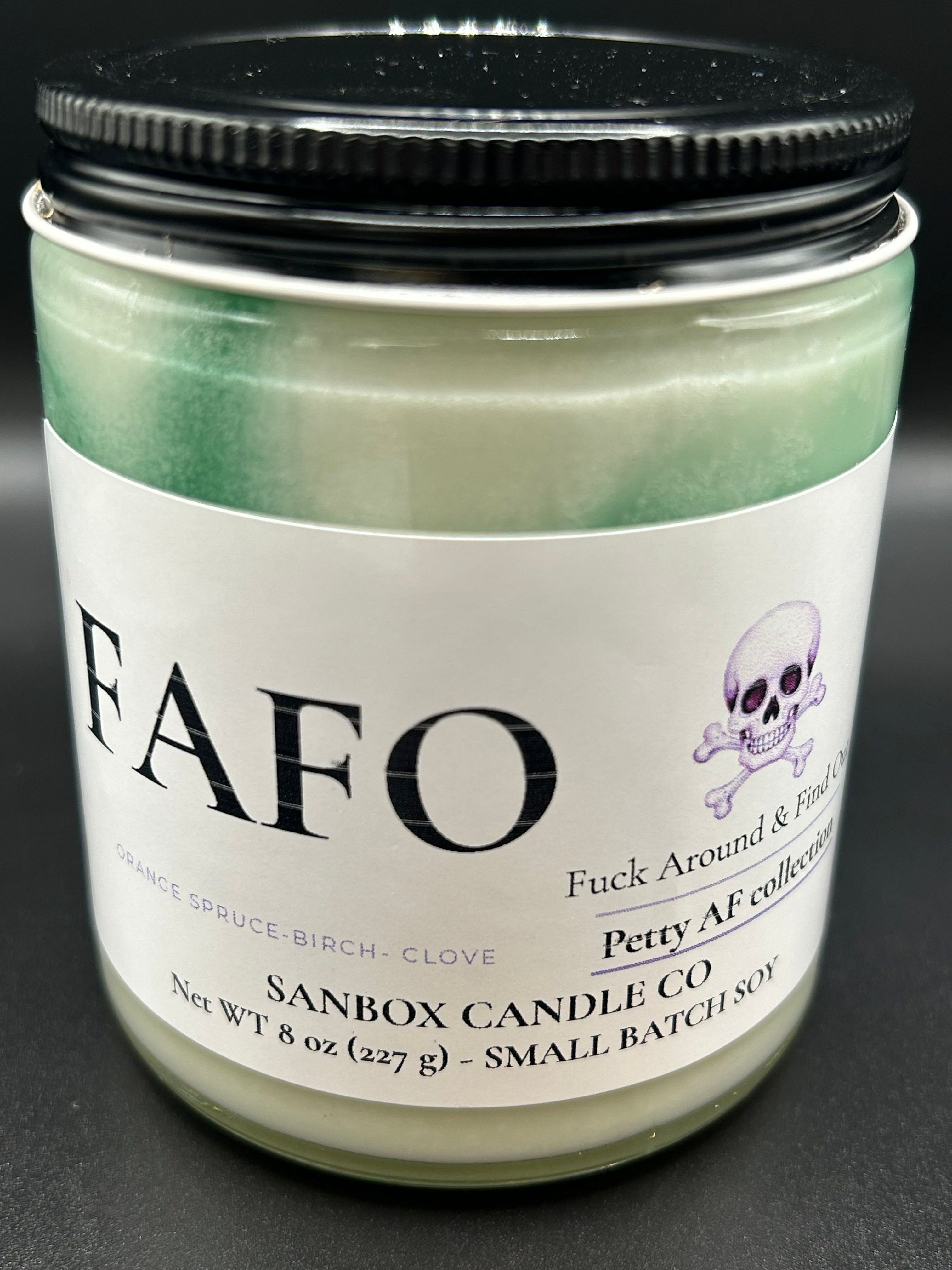 8oz soy scented candle in glass jar, green and white swirls, Petty AF label with skull graphic