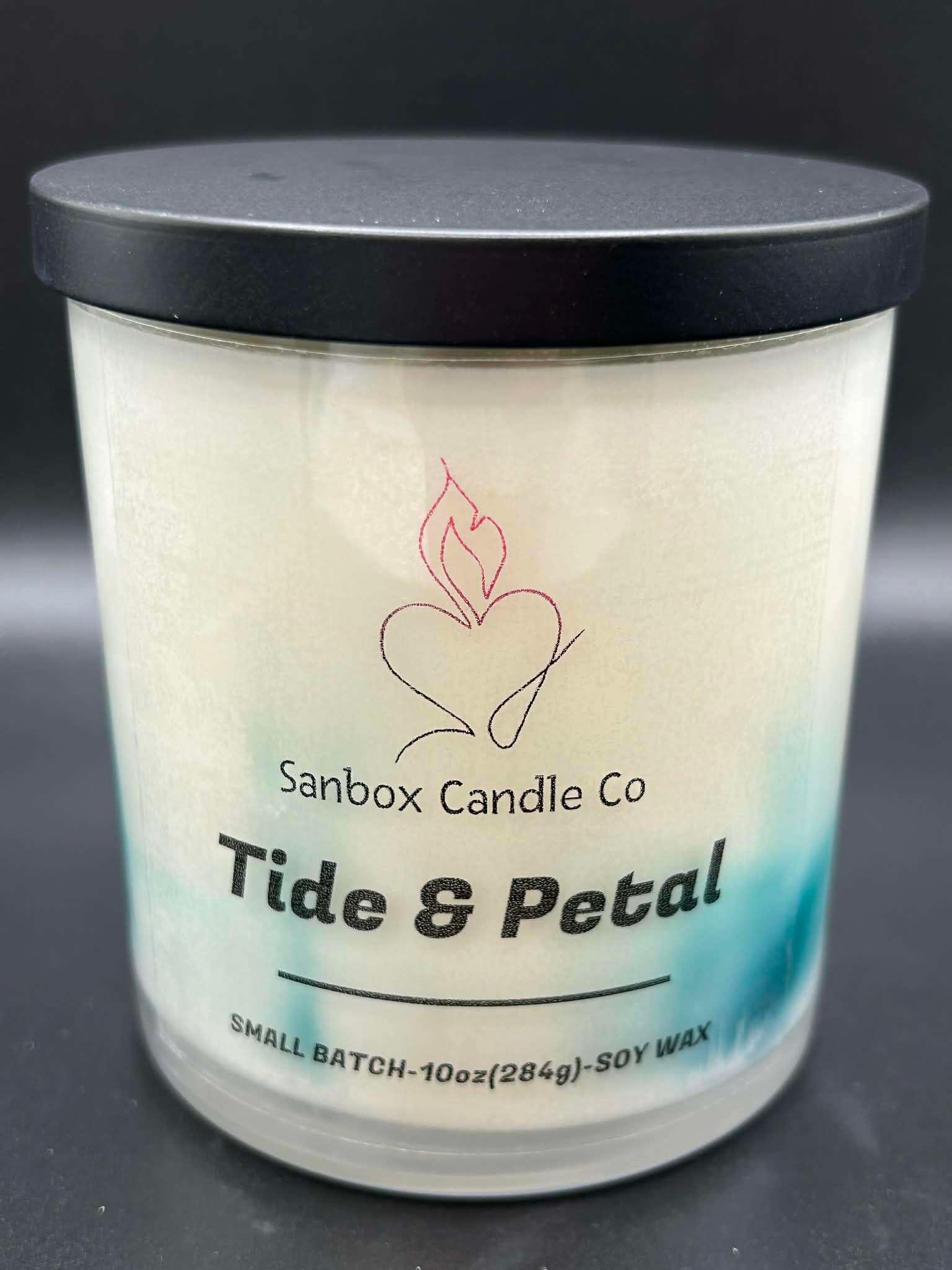 Tide & Petal scented soy candle, 10oz glass jar with black lid and spa-inspired design