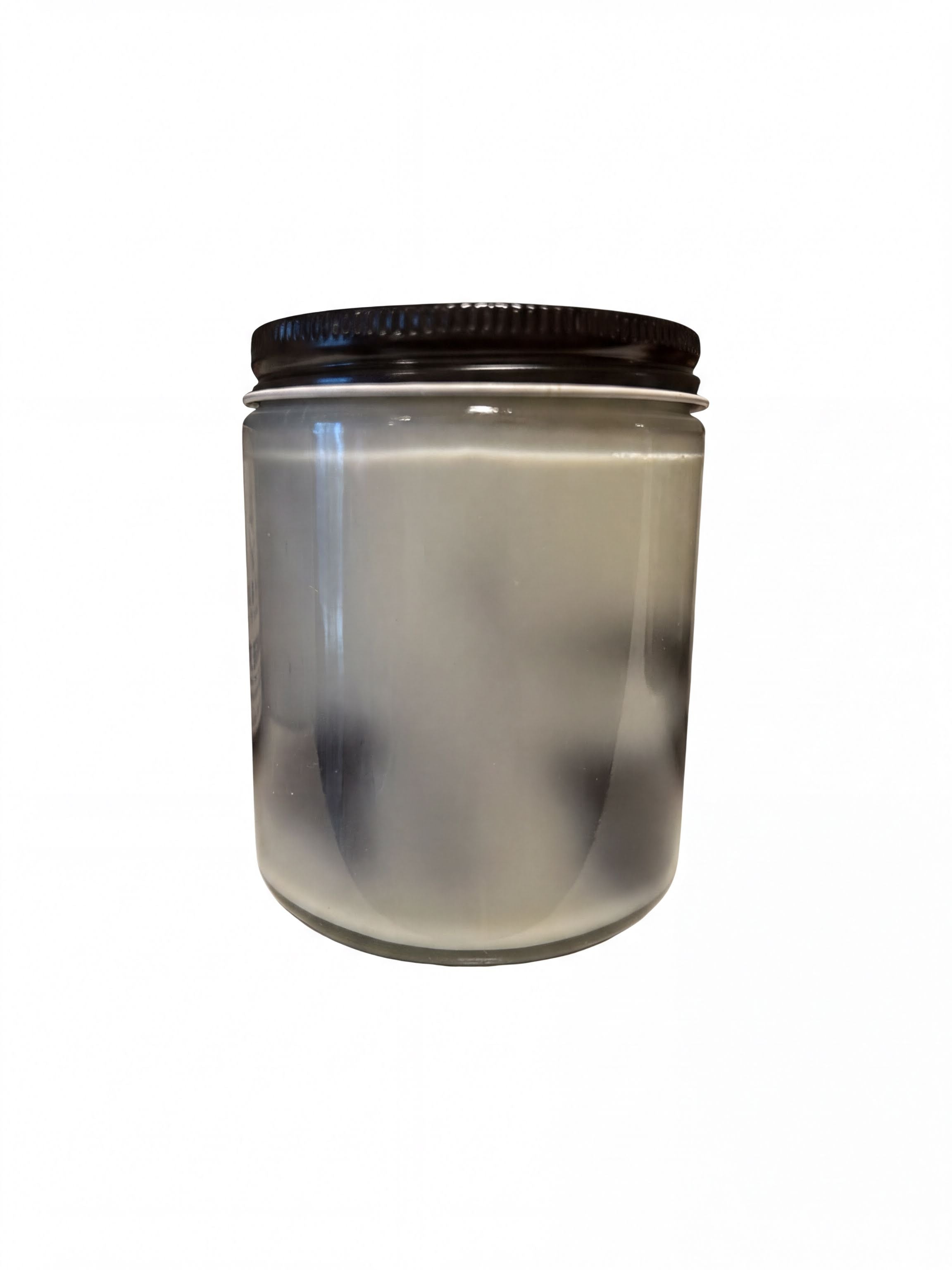 A clear glass jar with a black lid, sitting on a white background.