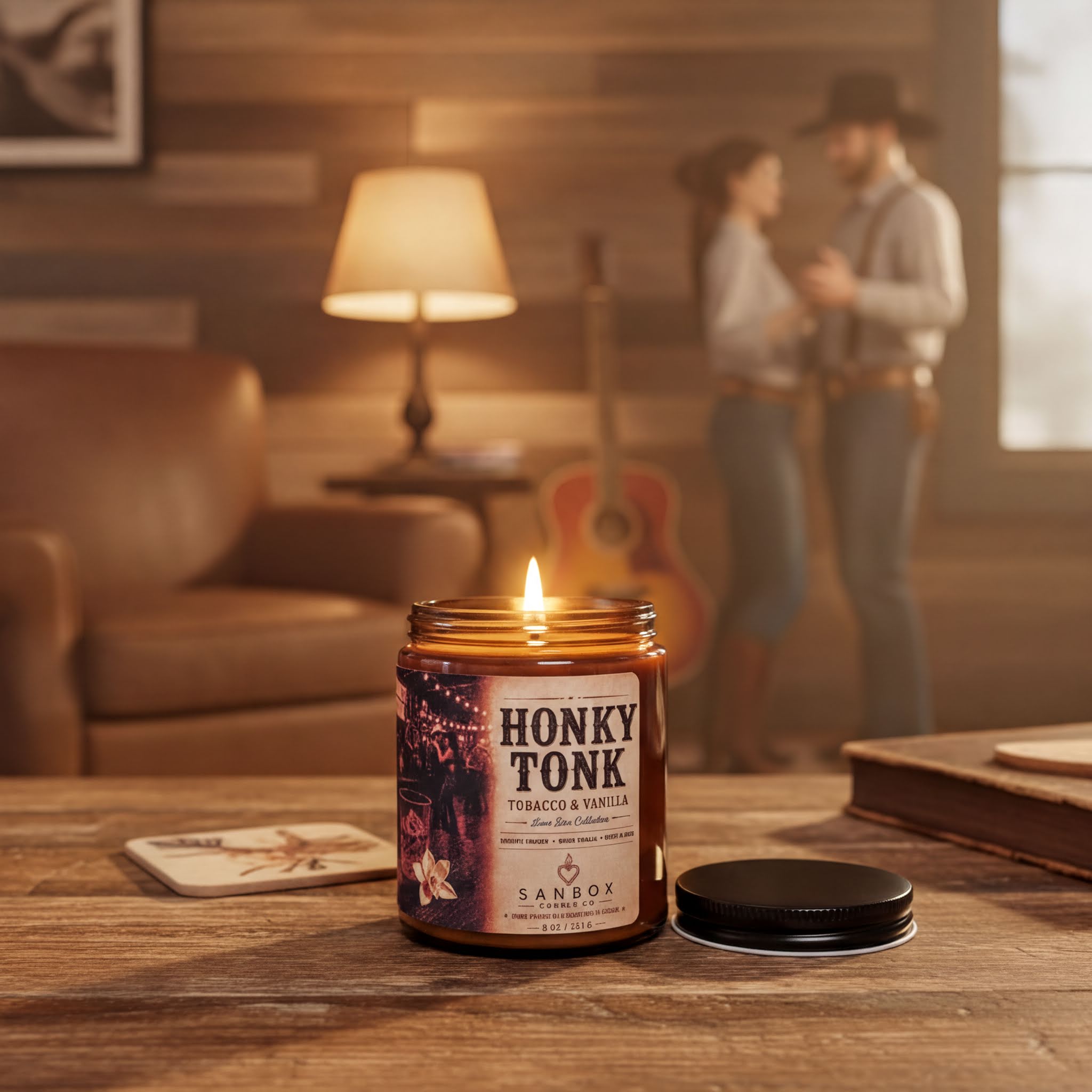 a candle labeled "HONKY TONK" on a wooden table, with a lit candle in the center. In the background, there are two people, one wearing a cowboy hat and the other a tie, standing near a guitar.