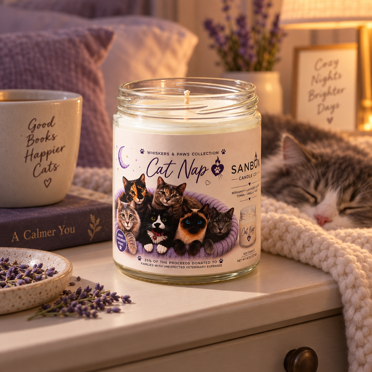Lit Cat Nap 8 oz pet odor-eliminating soy candle in a clear glass jar with an illustrated multi-cat label, lavender sprigs, and wood-slice display