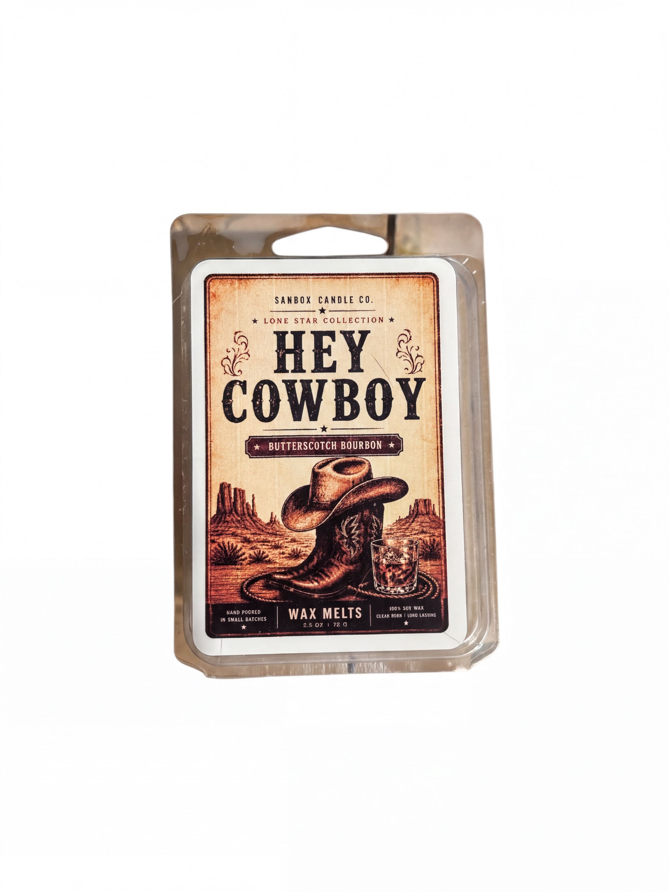 a package of candles with a cowboy hat and a desert landscape on the label.