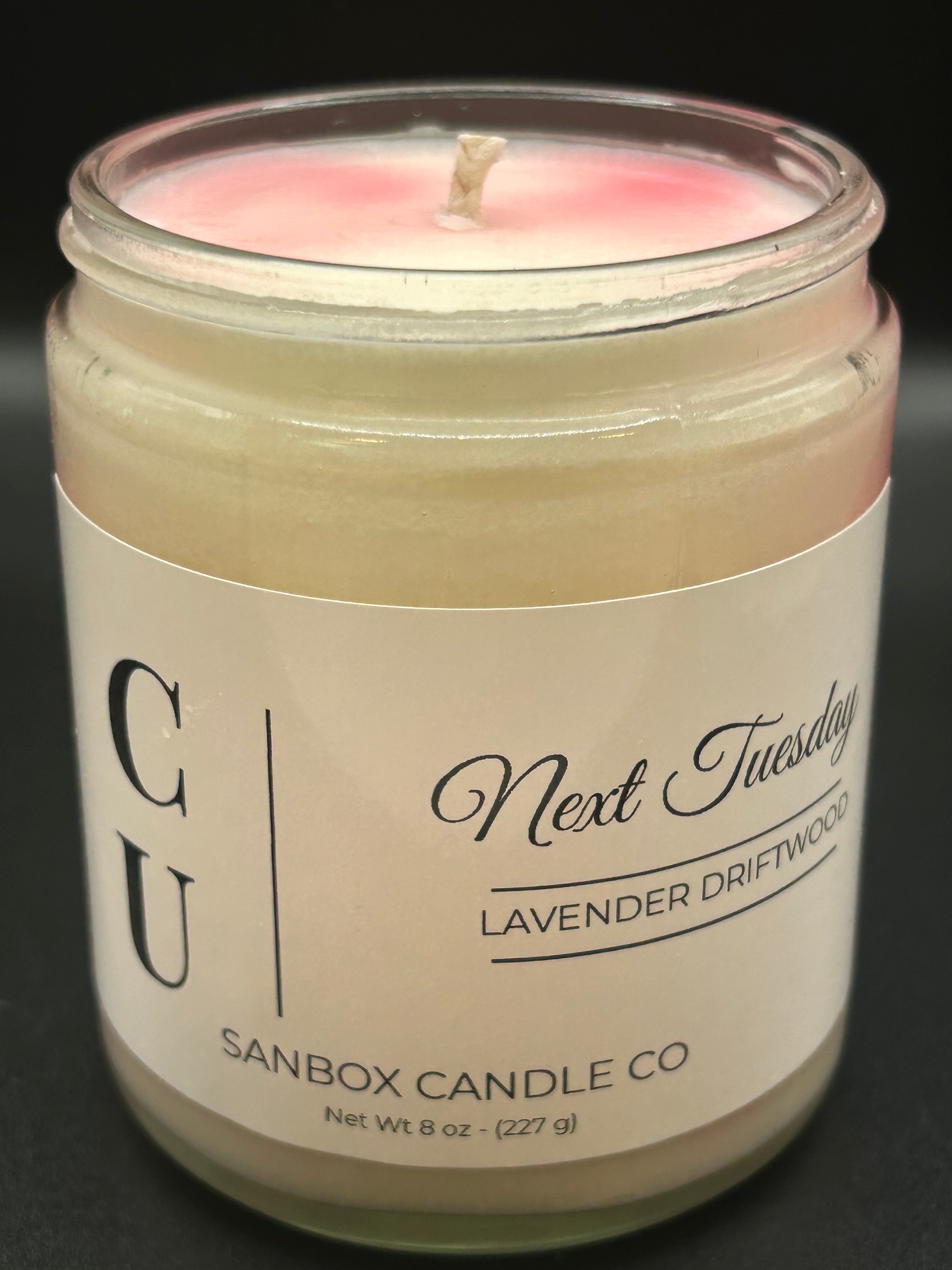 Lavender Driftwood scented candle in glass jar with white label, 8oz size, single wick