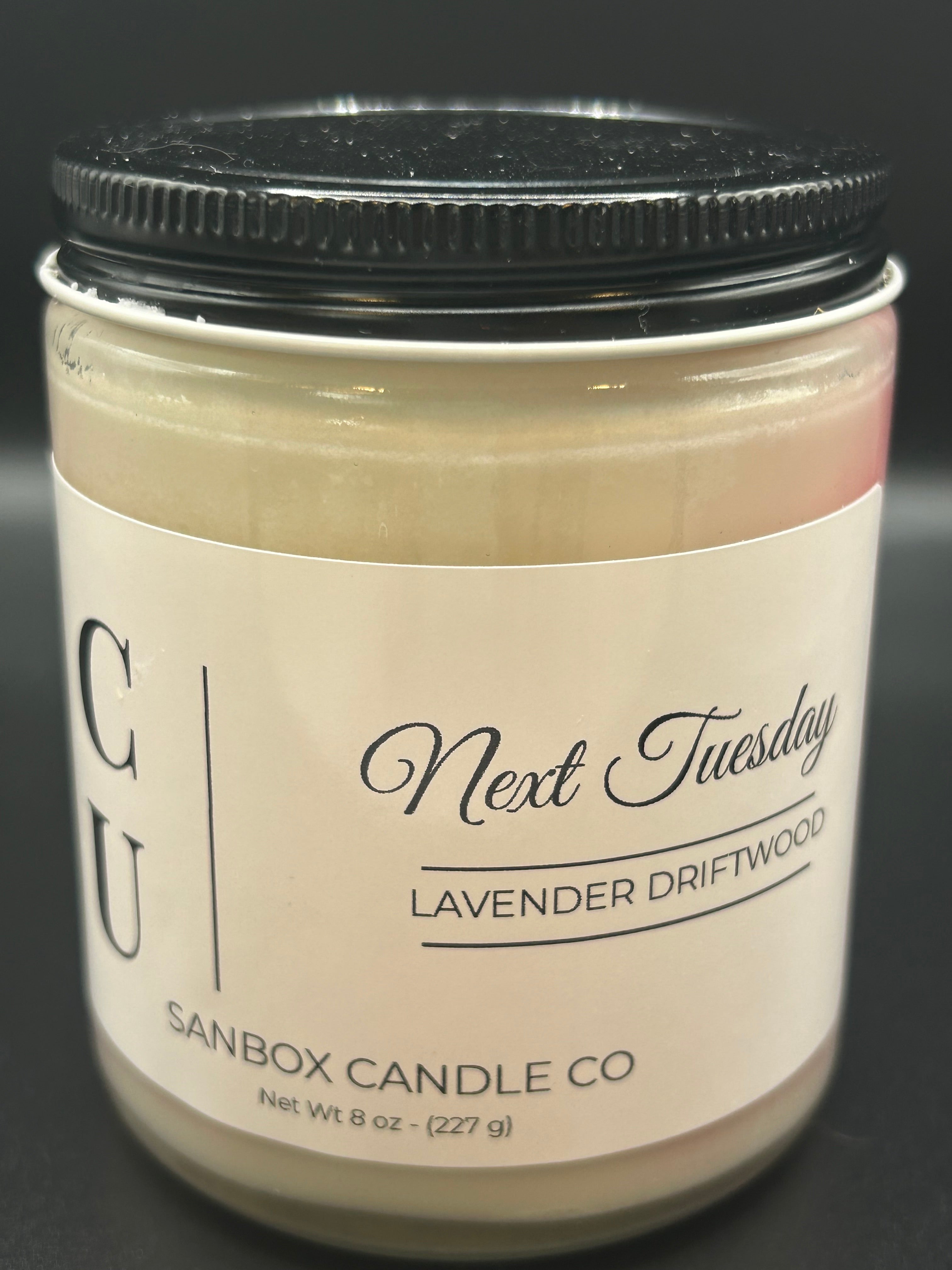 Lavender Driftwood soy candle in glass jar with black lid and minimalist label